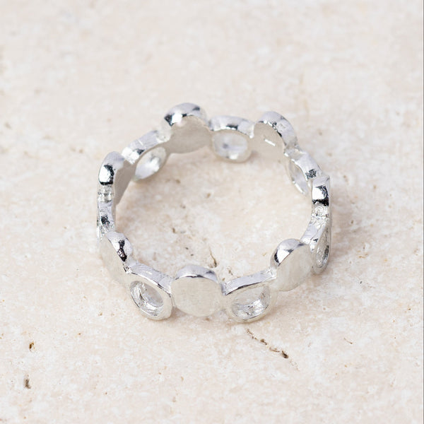 Pebble ring in recycled sterling silver, a band of hand shaped silver pebbles, handmade in Cornwall