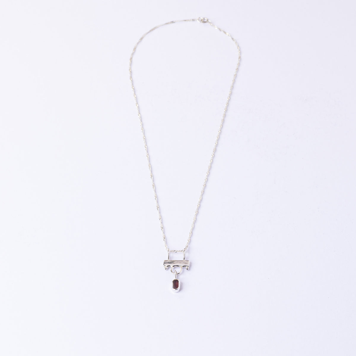 Full length of the deep purple hanging bar necklace on its sterling silver chain